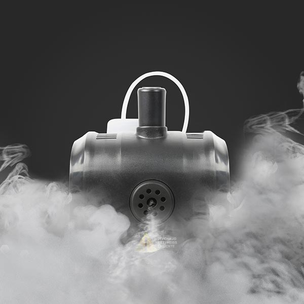 A smoke machine for halloween parties on a dark background with smoke effect